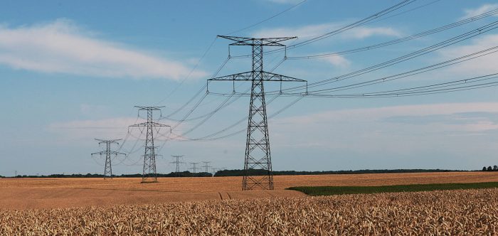 Electricity pylons over farmland